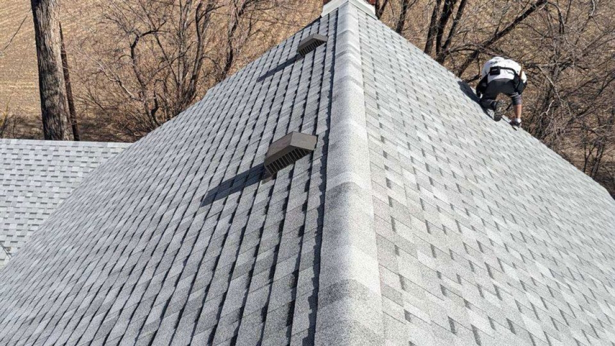 One of the many styles of asphalt shingles available for roof replacement