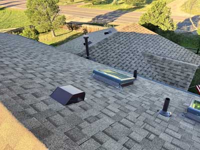 Asphalt residential roof replacement in Colorado by Custom Exteriors