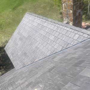 Greeley roofing contractor using synthetic shingles to install a new roof in Greeley