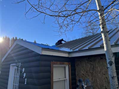 Residential metal roof replacement by Custom Exteriors