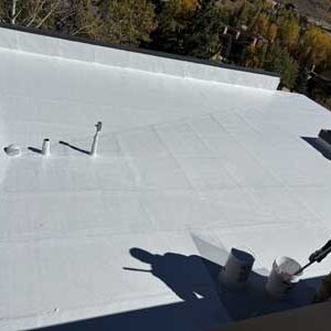Dacono commercial roofing company completing a commercial roof coating
