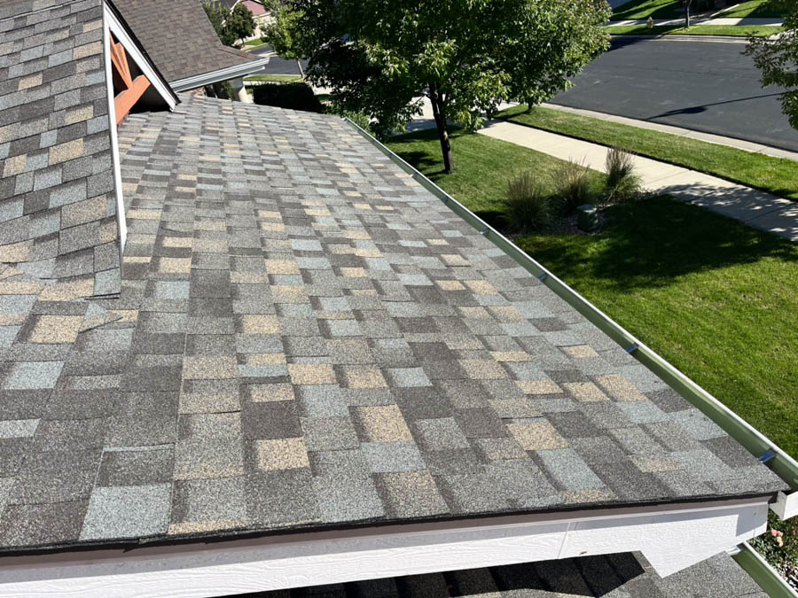 Asphalt roof replacement in Erie by Custom Exteriors