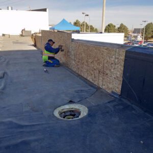 Commercial roof installation by Custom Exteriors