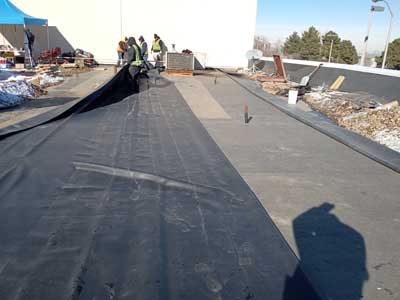 Commercial roof replacement by Custom Exteriors