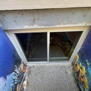 Basement window replacement by Custom Exteriors