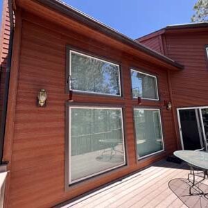 Wood siding stained by Custom Exteriors