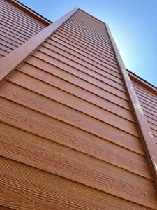 Stained wood siding by Custom Exteriors
