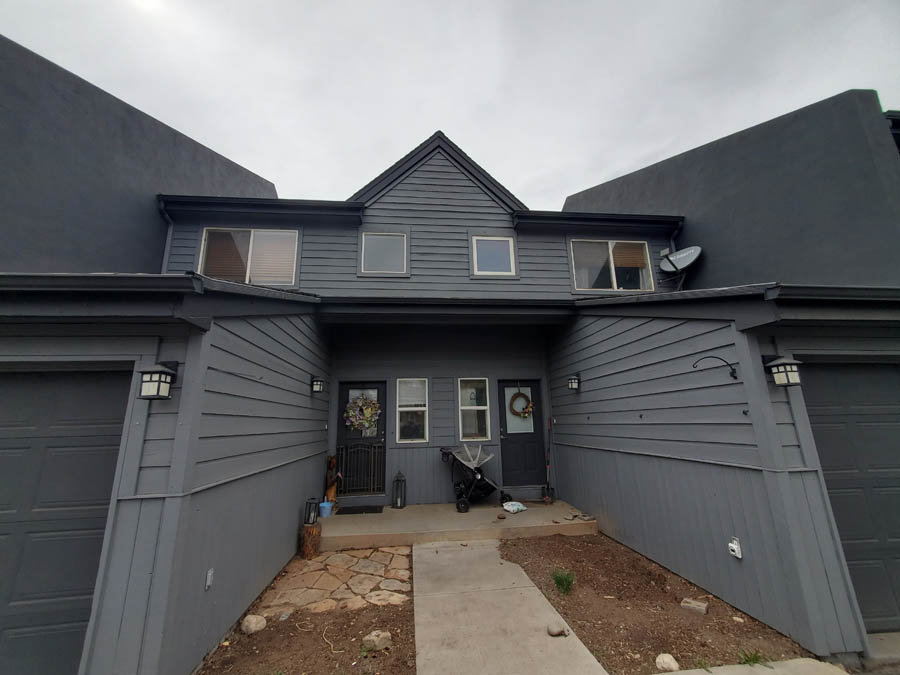 Exterior painting on a multi-family community by Custom Exteriors