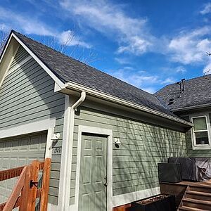 Residential roofing, siding, windows, paint and gutters by Custom Exteriors, a Colorado roofing company