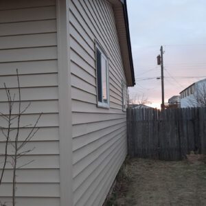 Fort Morgan Siding replacement company, Custom Exteriors replacing siding on a home