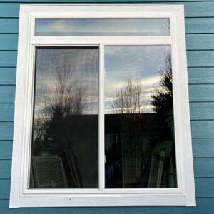 Colorado Springs window replacement company, Custom Exteriors replacing a residential window