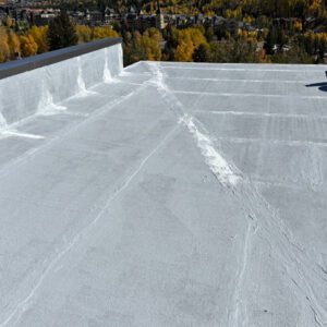 Commercial roof coating by Estes Park commercial roofing contractor, Custom Exteriors