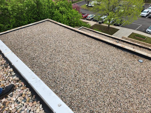 Commercial roof replacement by Custom Exteriors, a Fort Collins commercial roofer