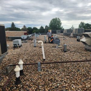 Commercial roof replacements by commercial roofing company, Custom Exteriors