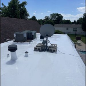 A commercial roof coating completed by Custom Exteriors in Northern Colorado, one of the areas in their commercial roofing service map