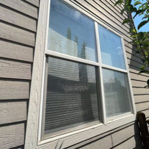 Evans window replacement by Custom Exteriors