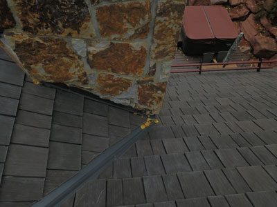 Evergreen roofing company, Custom Exteriors replacing a synthetic shingle roof in the Colorado mountains