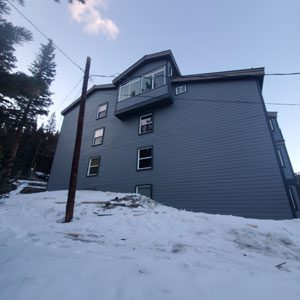 Multi-family siding replacement, exterior painting by Custom Exteriors