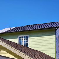 Metal roof replacement by Custom Exteriors in Loveland