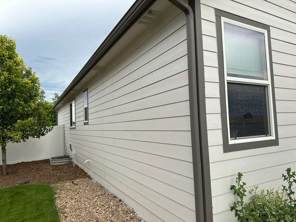 Siding company, Custom Exteriors replacing the siding on a Northern Colorado home