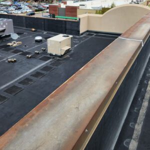 Commercial roof replacement company Custom Exteriors roof inspection