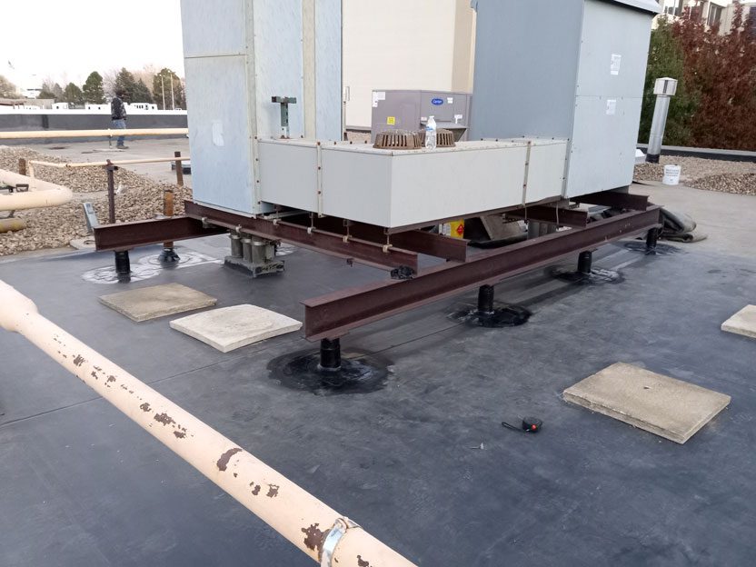 Commercial roofing company, Custom Exteriors completes a flat roof replacement in Denver, Colorado