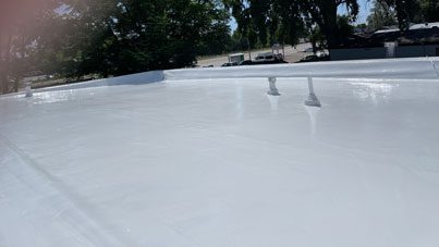 Commercial roof coating by Custom Exteriors