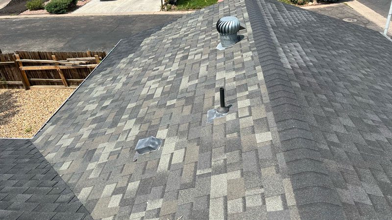 Asphalt shingle roof replacement by Timnath roofing contractor, Custom Exteriors