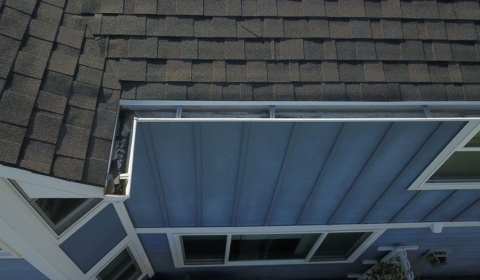 A new roof installed by Custom Exteriors with IKO Nordic shingles in Driftwood