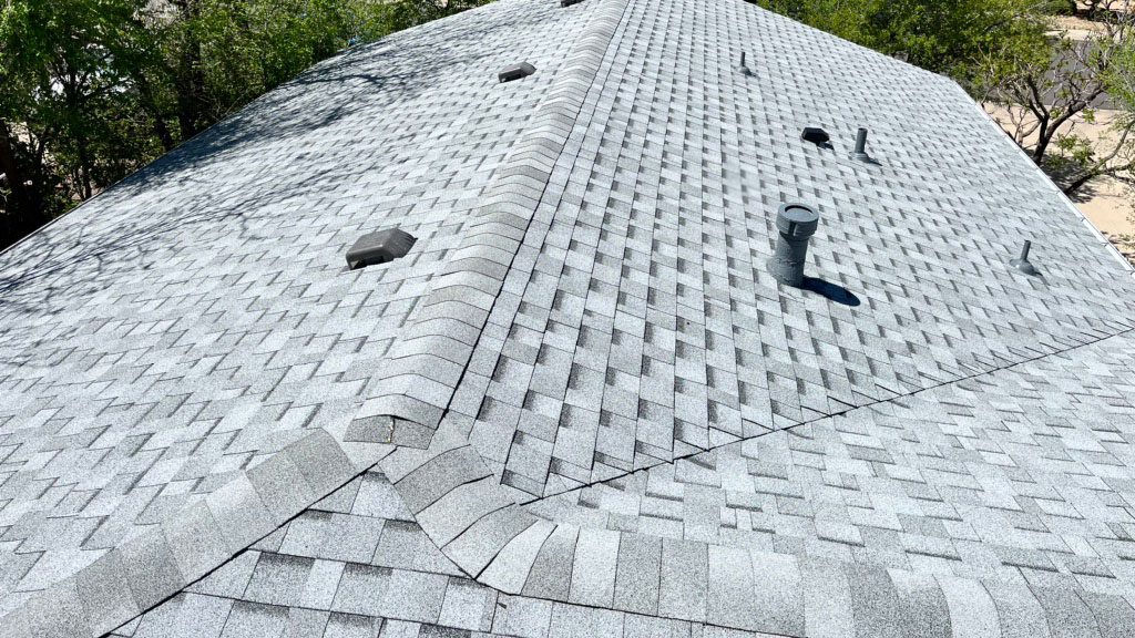 A new roof installed by Custom Exteriors with IKO Cambridge shingles in Dual Grey