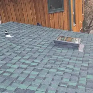 Completed Certainteed roof replacement on West Loveland roof by Custom Exteriors.