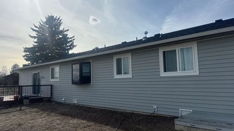 Vinyl siding replacement Berthoud - Custom Exteriors, LLC Custom Exteriors replaced both the vinyl siding and the roof on this Berthoud home.
