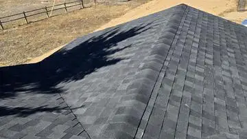 Roof installation - Custom Exteriors, LLC Completed roof replacement by Custom Exteriors with IKO impact resistant shingles.