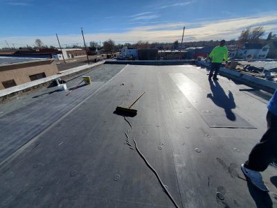 Custom Exteriors installs and inspects flat roofs throughout Colorado
