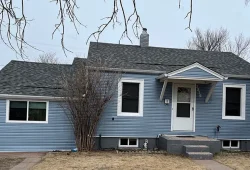 An exterior paint job competed by the painting team at Custom Exteriors.