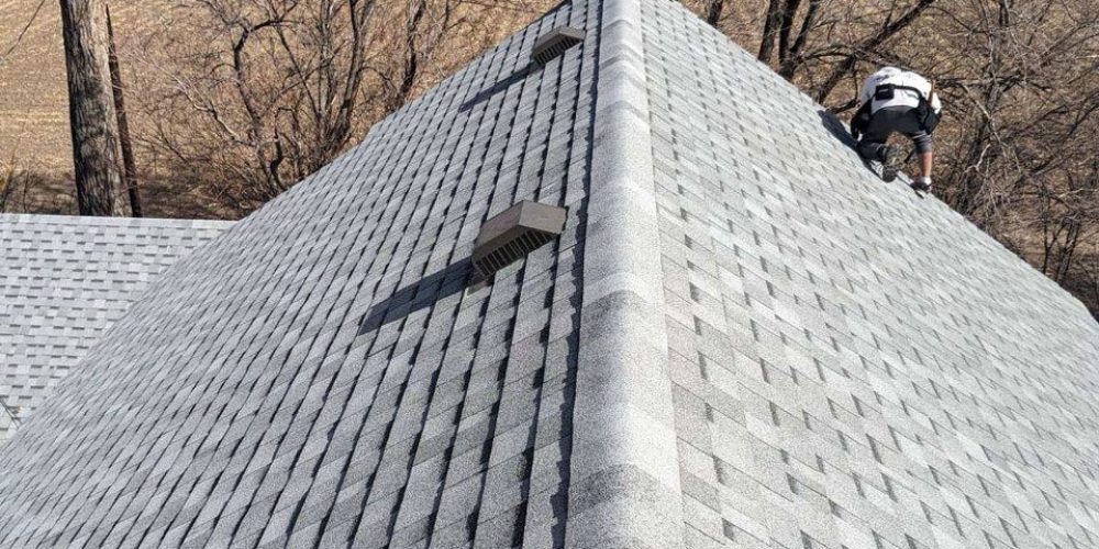 One of the many styles of asphalt shingles available for roof replacement