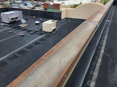 Commercial roof replacement company Custom Exteriors roof inspection