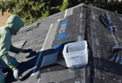 The crew at Custom Exteriors replacing a Northern Colorado roof.